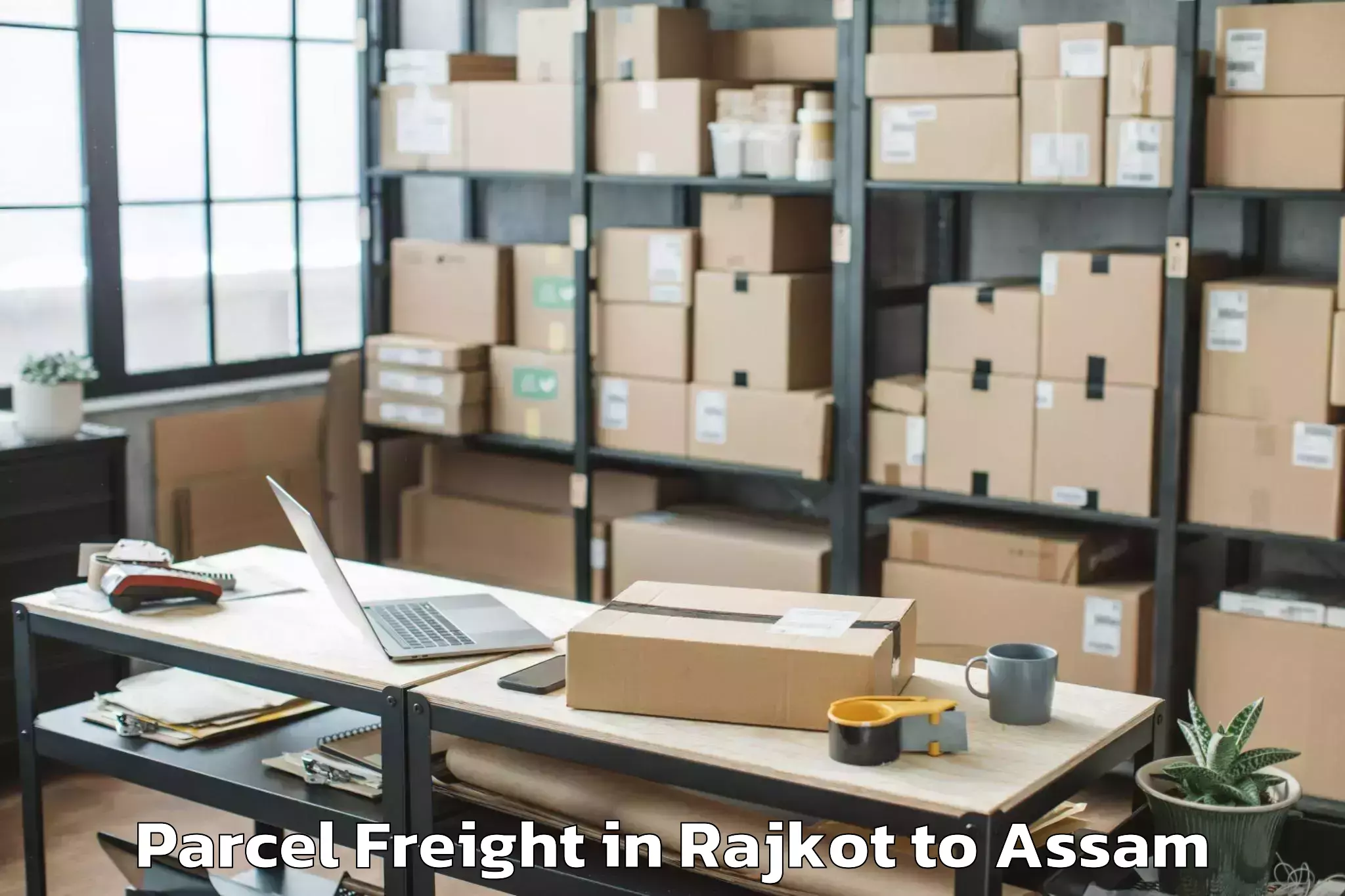 Rajkot to Dhing Town Parcel Freight Booking